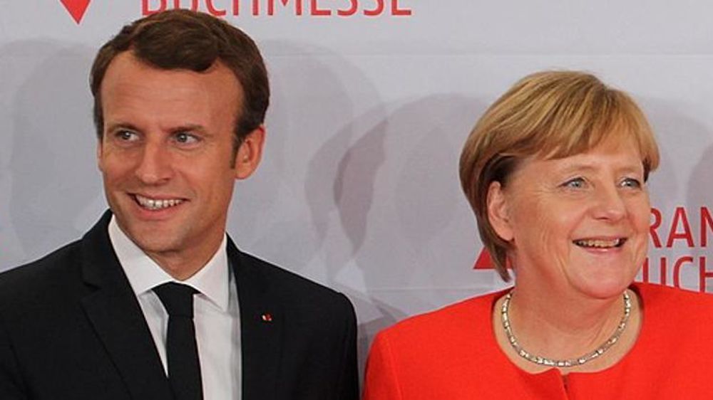 Emmanuel Macron et Angela Merkel. © Wikimedia Commons